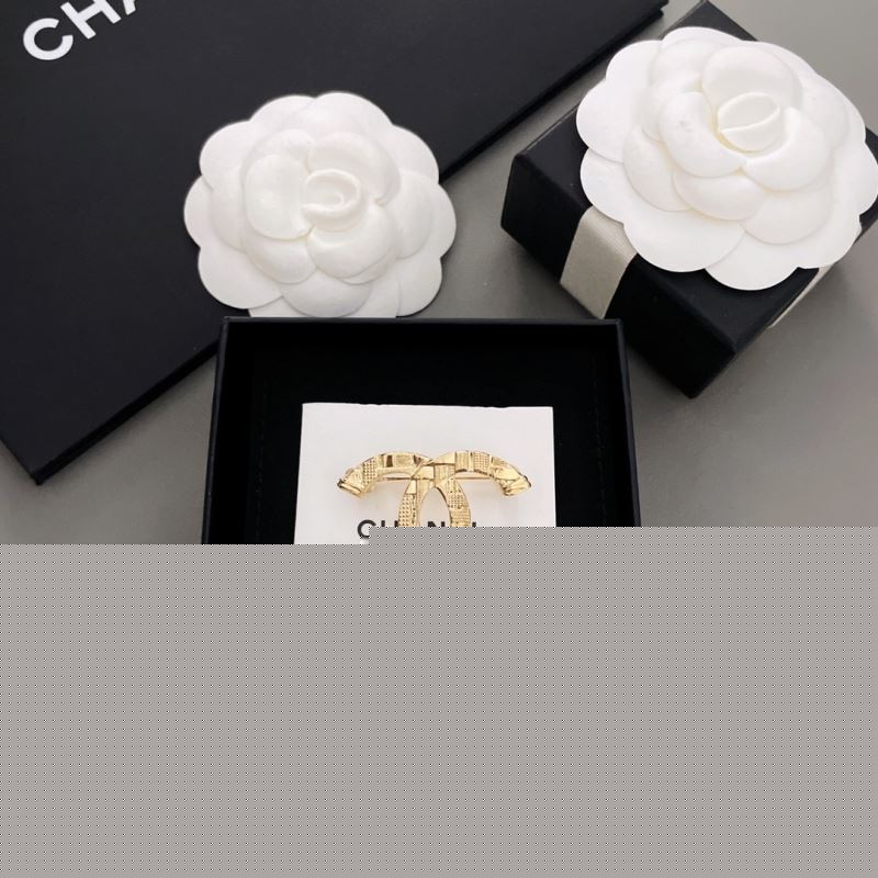 Ch*el brooches